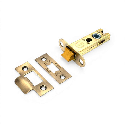 Aged brass tubular latch with faceplate and strike plate components