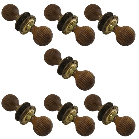 7 Pairs of Rosewood & Aged Brass Beehive Door Knobs
