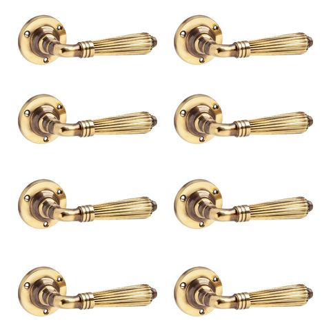8 Pairs of Aged Brass Regency Lever Door Handles