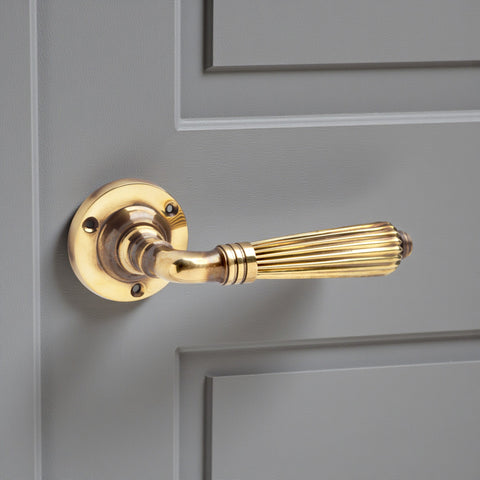 8 Pairs of Aged Brass Regency Lever Door Handles