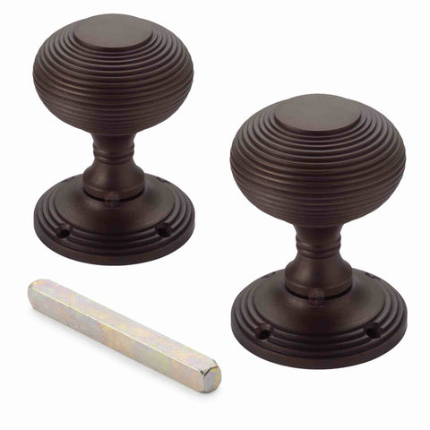 Matt antique beehive mortice door knob pair with matching round roses and spindle, ideal for traditional internal doors.