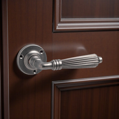 8 Pairs of Pewter Regency Lever Door Handles