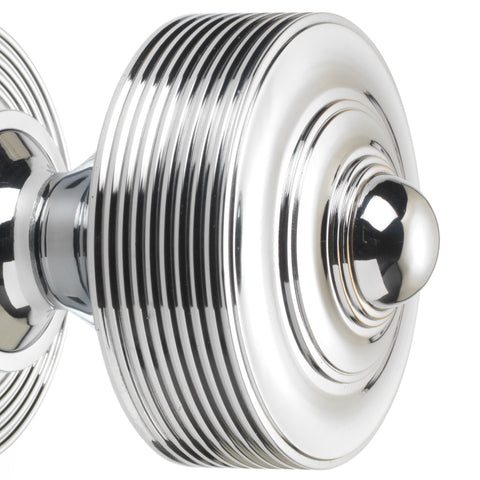 Detailed view of polished chrome reeded centre door knob showing decorative concentric detailing
