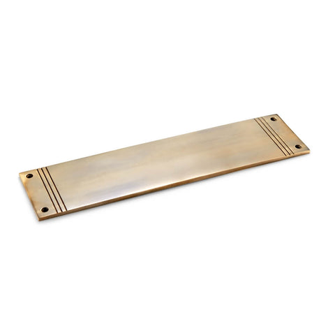 Unlacquered aged brass reeded push plate, 305mm x 75mm, angled view showing natural patina and stepped detailing