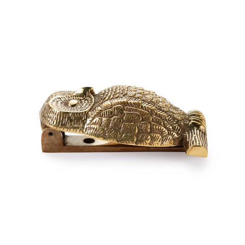 Unlacquered aged brass owl door knocker shown open, highlighting the hinged striking mechanism
