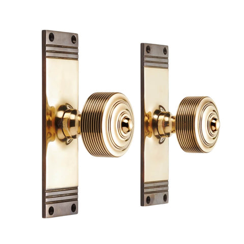 Aged Brass Reeded Door Knobs On Backplate