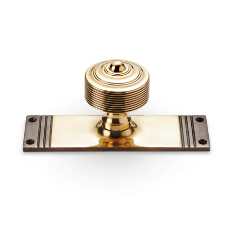 aged brass reeded door knob on rectangular backplate solid brass traditional door furniture