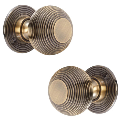 Antique Brass Beehive Door Knobs Pair Angled Front View