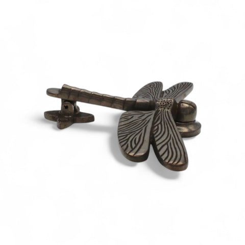 Flat view of antique Dragonfly Door Knocker on white background