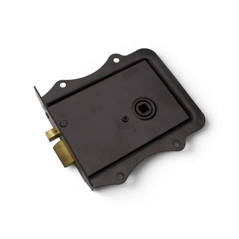 Rear angled view of black olde Victorian rim lock showing back plate and brass latch mechanism.