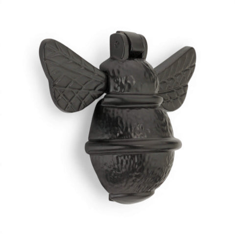 Black cast iron bumble bee door knocker front view with powder coated finish and detailed wings on white background