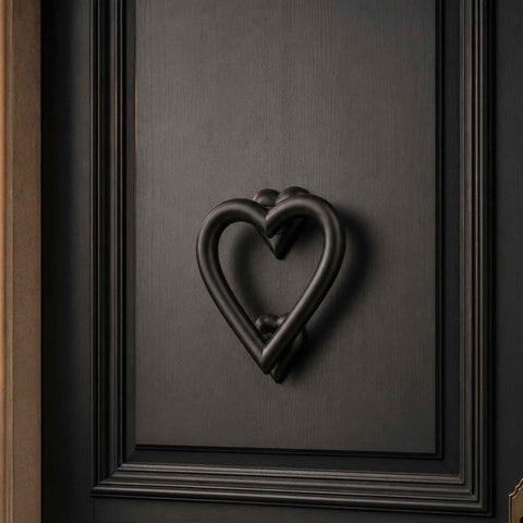 Powder Coated Black Cast Iron Heart Door Knocker Installed on a Traditional Black Front Door