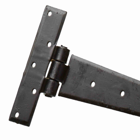 Close-up of black wrought iron penny end T hinge showing hinge knuckle and fixing holes