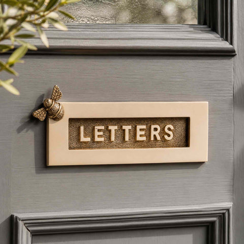 Bumble Bee LETTERS Letter Plate in Unlacquered Polished Brass Fitted to Grey Front Door