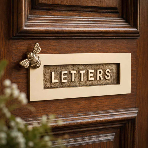 Bumble Bee LETTERS Letter Plate in Unlacquered Polished Brass Mounted on Wooden Front Door