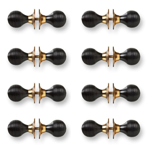 8 Pairs of Ebony Polished Brass Beehive Door Knobs