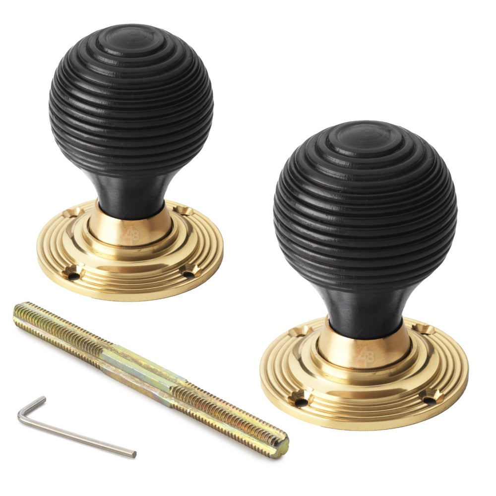 6 Pairs of Ebony Polished Brass Beehive Door Knobs