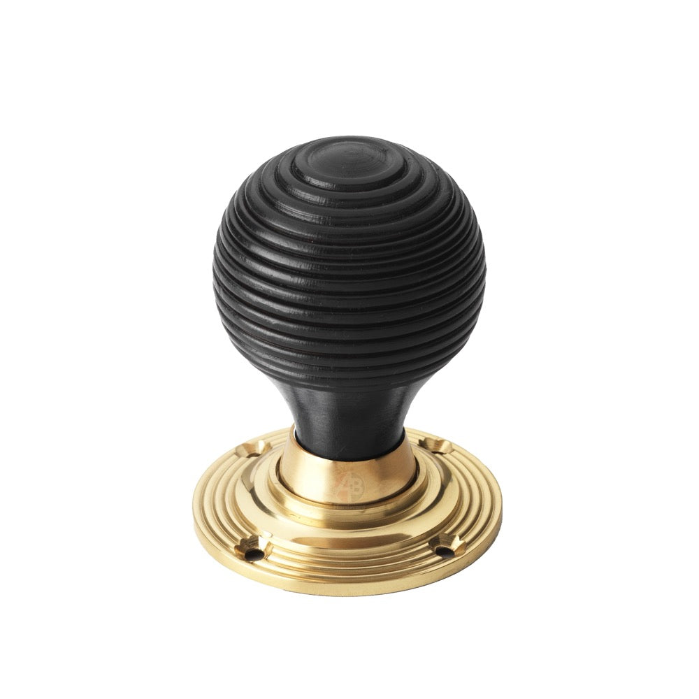6 Pairs of Ebony Polished Brass Beehive Door Knobs
