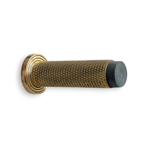 Knurled Cylinder Door Stop Reeded Backplate - Aged Brass