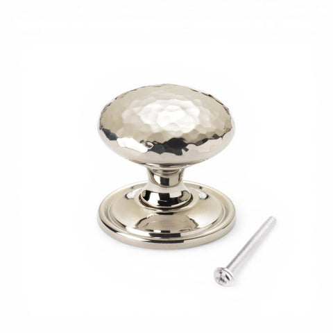 38mm solid polished nickel hammered cupboard knob with plain backplate and fixing screw on white background