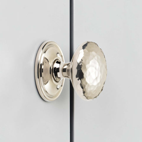 38mm solid polished nickel hammered cupboard knob with plain backplate fitted to grey cabinet door