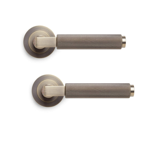 Front view of matt antique brass knurled lever door handle showing knurled grip