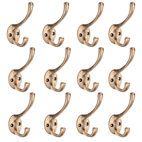 Pack of 12 antique brass Victorian coat hooks with dual hook design and round backplates