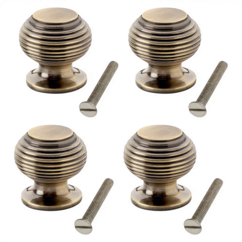 Pack of 4 small antique brass beehive cupboard knobs with fixing screws