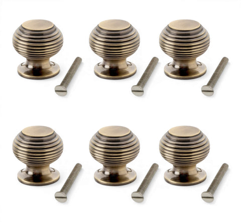 Pack of 6 small antique brass beehive cupboard knobs with fixing screws