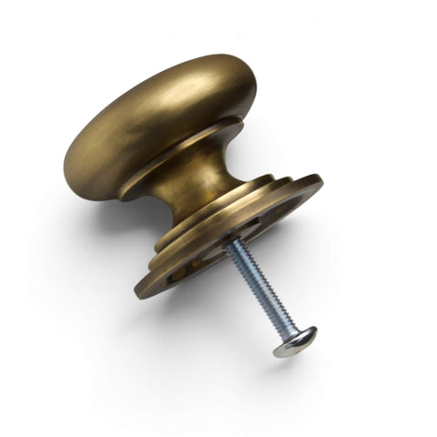 Antique brass cupboard knob fitted with M4 rear fixing bolt for cabinet and drawer installation