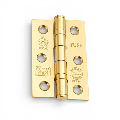 Single polished brass CE7 ball bearing butt hinge, fire rated to BS EN 1935, front view on a white background