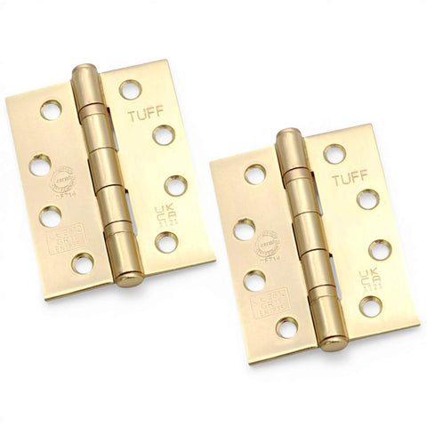 Pair of satin brass CE11 ball bearing butt hinges, 100mm steel fire rated door hinges on white background.