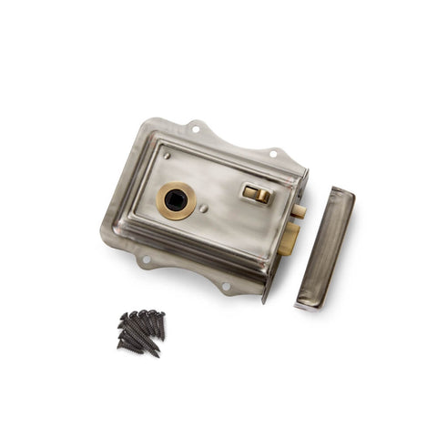 Front view of pewter and antique brass Olde Victorian rim lock showing flanged design