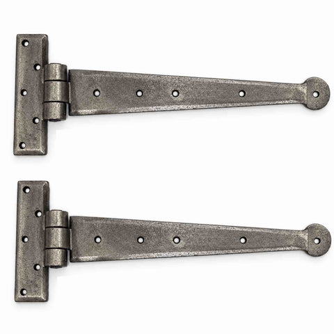 Pair of traditional pewter Penny End T hinges showing handmade textured finish