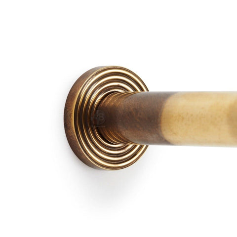 Solid Brass Cylinder Door Stop On Reeded Backplate - Aged Brass