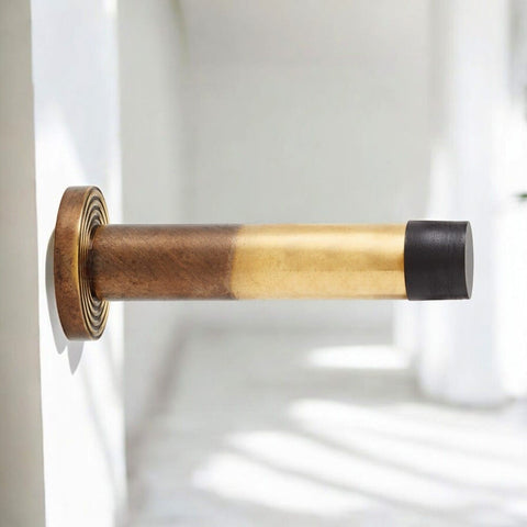 Solid Brass Cylinder Door Stop On Reeded Backplate - Aged Brass