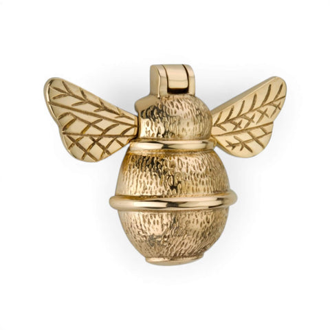 Unlacquered polished brass bumble bee door knocker, straight-on view highlighting engraved wing pattern and bright finish.