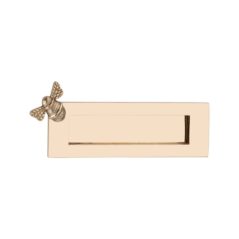 Front view of polished brass bumble bee letter plate with plain flap and decorative bee design