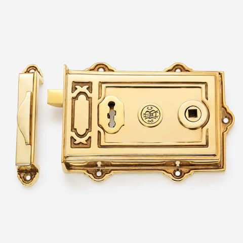 Polished Brass Davenport Rim Lock and Keep Set on White Background