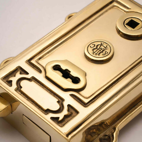 Close-Up of Polished Brass Davenport Rim Lock with Decorative Detailing