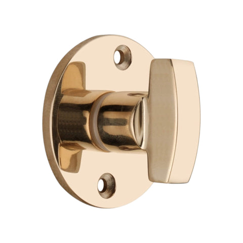 Close-Up of Plain Unlacquered Polished Brass Thumb Turn on Round Rose
