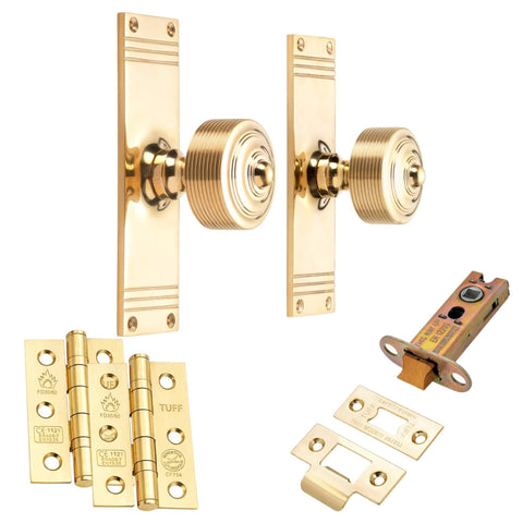 unlacquered polished brass reeded door knobs on backplate with 3 inch heavy duty latch and CE7 hinges latch pack