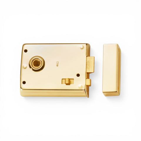 Polished brass rim latch lock front view with matching keep