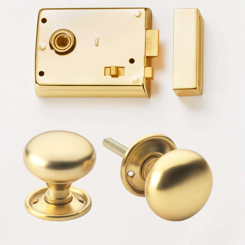Polished brass rim latch lock with lacquered matt brass cottage door knobs