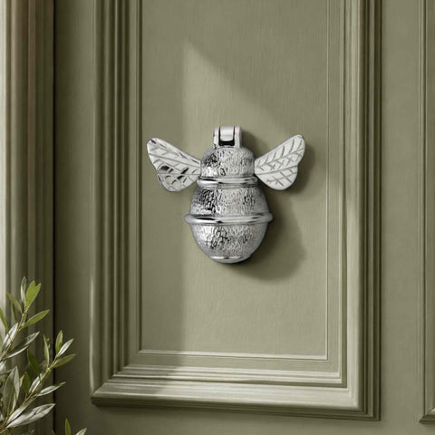 Polished Chrome Bumble Bee Door Knocker mounted on a traditional sage green panelled front door