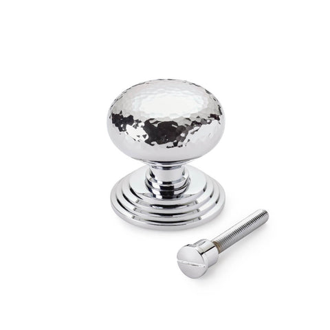 Hammered polished chrome cottage centre door knob with stepped backplate supplied with fixing bolt, on white background