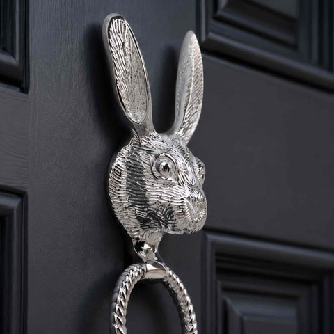 Macro close-up of the polished chrome hare head showing the finely detailed facial features, textured ears and high-shine chrome finish.