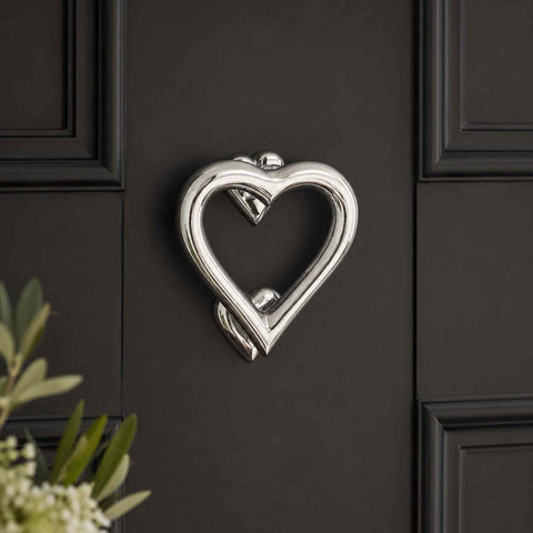 Polished Chrome Heart Door Knocker Installed on a Contemporary Black Front Door