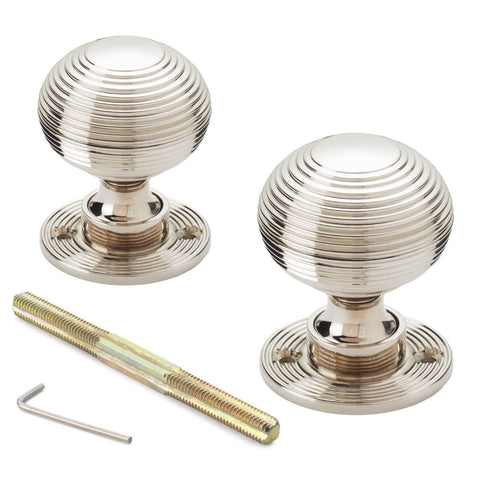 Pair of polished nickel reeded beehive mortice door knobs with threaded spindle, fixing screws and allen key included