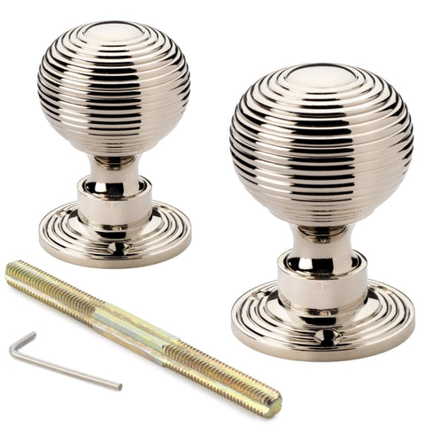 Pair of polished nickel reeded beehive rim mortice door knobs with threaded spindle and allen key included.